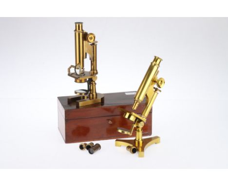 2 Victorian Microscope By R &amp; J Beck, London, comprising of: A microscope on a horseshoe shaped base engraved 'R &amp; J 