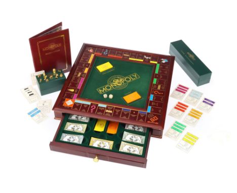 A Monopoly Franklin Mint Collectors Edition Wooden Board Game, in VG used condition, complete with all games pieces, bank not