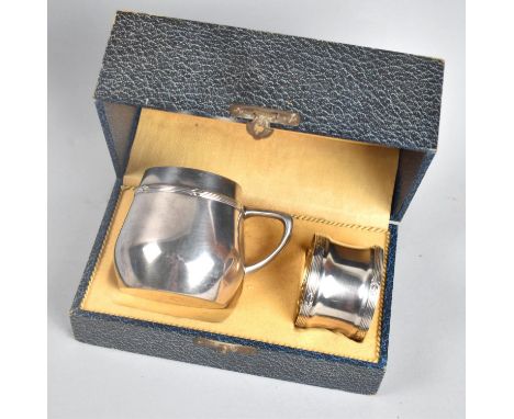 A WMF Christening Set, Date Letter G with Ostrich, Napkin and Tankard 