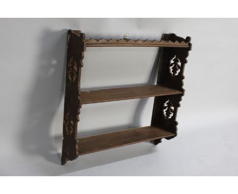 An Edwardian Wall Hanging Three Shelf Unit with Pierced Sides, 62cms Wide 