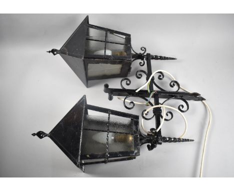 A Pair of Modern Wrought Iron Wall Hanging Outside Lights, One Glass Panel Missing, Each 45cms High 