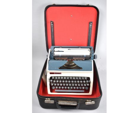 A Vintage Erika Manual Portable Typewriter with Instruction Booklet 