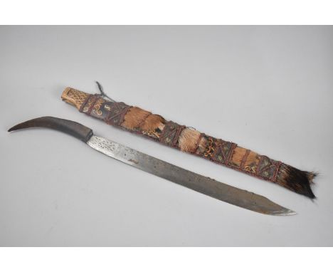 A Vintage African Tribal Sword with Scabbard, 57cms Long 