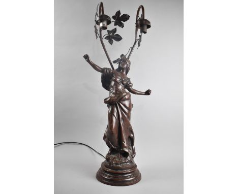 A Reproduction Spelter Two Branch Figural Table Lamp, 76cms High 