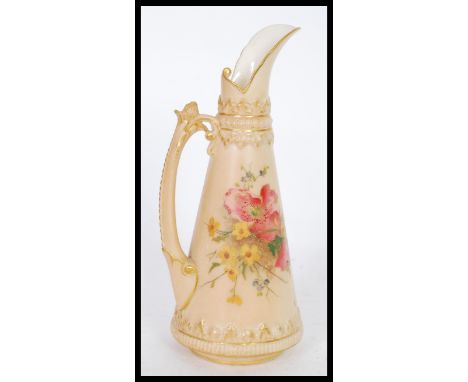 A early 20th Century Royal Worcester blush ivory jug of tapering form with hand painted floral sprays and gilt detailing. RD 