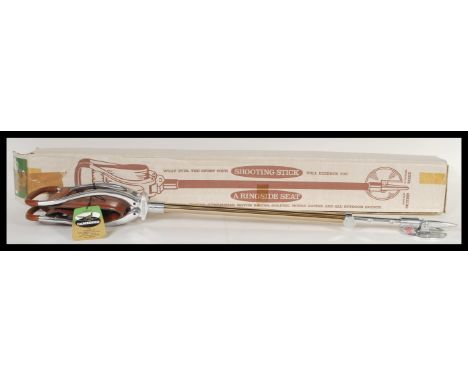 A vintage boxed brown leather and white metal shooting stick. 91cm long.&nbsp;