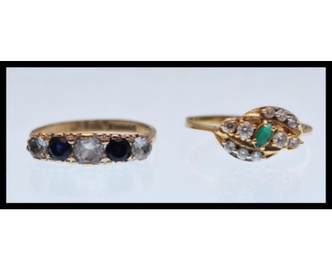 A hallmarked 9ct gold ring set with blue and white stones (hallmarked Birmingham, size O) along with a 9ct gold ring set with