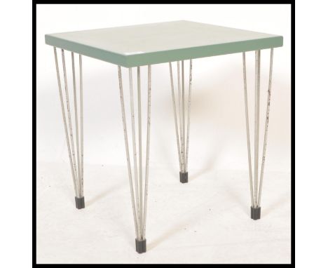 A vintage retro 1970's square Danish coffee / side table having chrome hairpin legs and blue top with labor underneath.&nbsp;