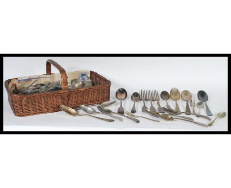 A collection of vintage early 20th Century flatware in the Kingd pattern to include knives, forks, spoons, serving spoons.