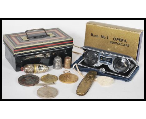 A collection of early 20th Century items to include a WWI first world war victory medal, a WWII Defence medal, an Education C