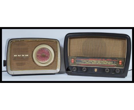 Two vintage radios - the first being a Phillips radio, the other being a Bush. Both in original wood-effect cases.&nbsp;