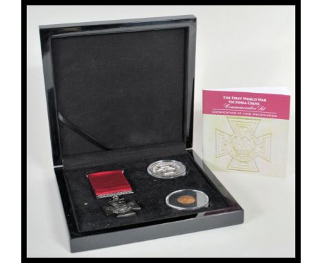 The First World War Victoria Cross Gold Half Sovereign Set - A Bradford Exchange two coin and medal coin set featuring a 1912