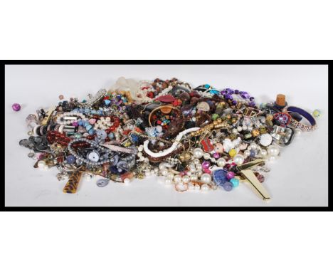 A collection of vintage and contemporary costume jewellery to include necklaces, bracelets, bangles,brooches, earrings etc.