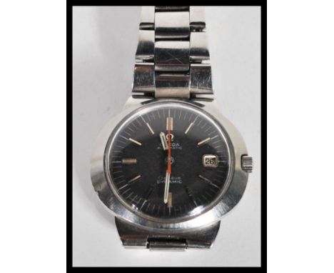 A vintage Omega Geneve Dynamic automatic gentleman's wrist watch, having a black dial with a silver chapter ring and a contra