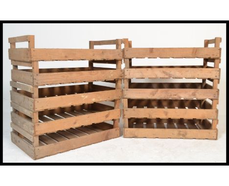 A set of ten vintage 20th century wooden Industrial apple / fruit / potato storage / transportation crates, some with notatio