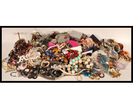 A very large collection of vintage costume jewellery to include a large selection of beaded necklaces and a wide range of jew