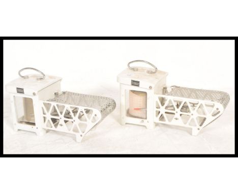 A pair of vintage 20th century retro industrial scientific Casella - London thermograms or hydrographs in white enamelled cas