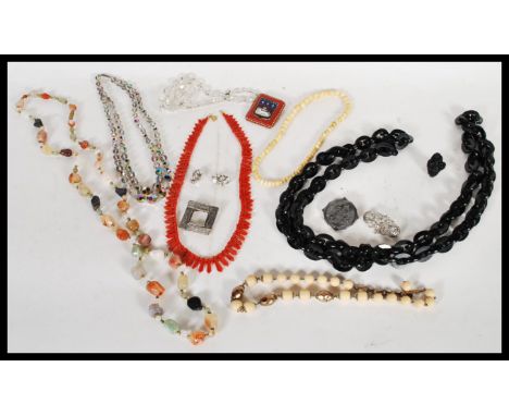 A selection of vintage costume jewellery to include a selection of beaded necklaces including polished agate, bone and others