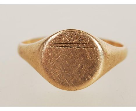A 18ct gold gentleman's signet ring with plain cartouche front, size L and 1.9g