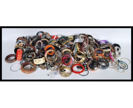 A very large collection of vintage costume jewellery to include bracelets, bangles, beads, made of silver and yellow metal, w