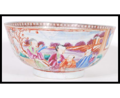 An 18th Chinese ceramic bowl having hand painting white cartouche panels depicting birds and trees with large hand painted pa