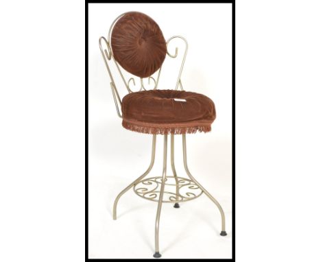 A retro vintage 20th century bedroom boudoir wire work dressing table chair having a scroll work metal frame with velour butt