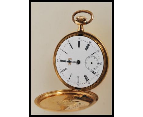 An early 20th century Swiss 18ct yellow gold cased crown wind full hunter fob watch, the circular engine turned decorated dia