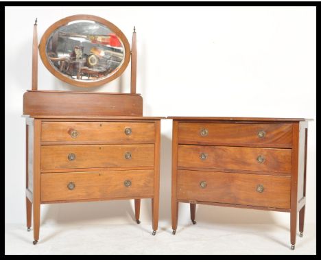 An early 20th CenturyEdwardian mahogany bedroom suite consisting of an three drawer dressing chest with swing mirror to the t