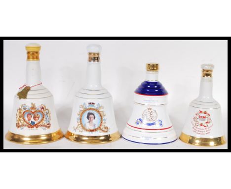 A selection of vintage Bell's whisky decanters to include a Princess Beatrice 1988 decanter, Charles and Diana's wedding comm