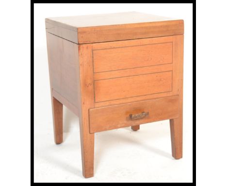 A vintage mid 20th Century wooden workbox / sewing box with fitted lift up lid revealing fitted sectional interior over singl