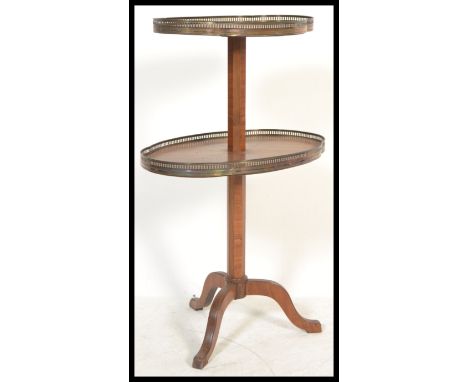 A late 19th Century / 20th century french two tier Kingwood and brass gallery dumbwaiter etagere. Each tier with gilt gallery