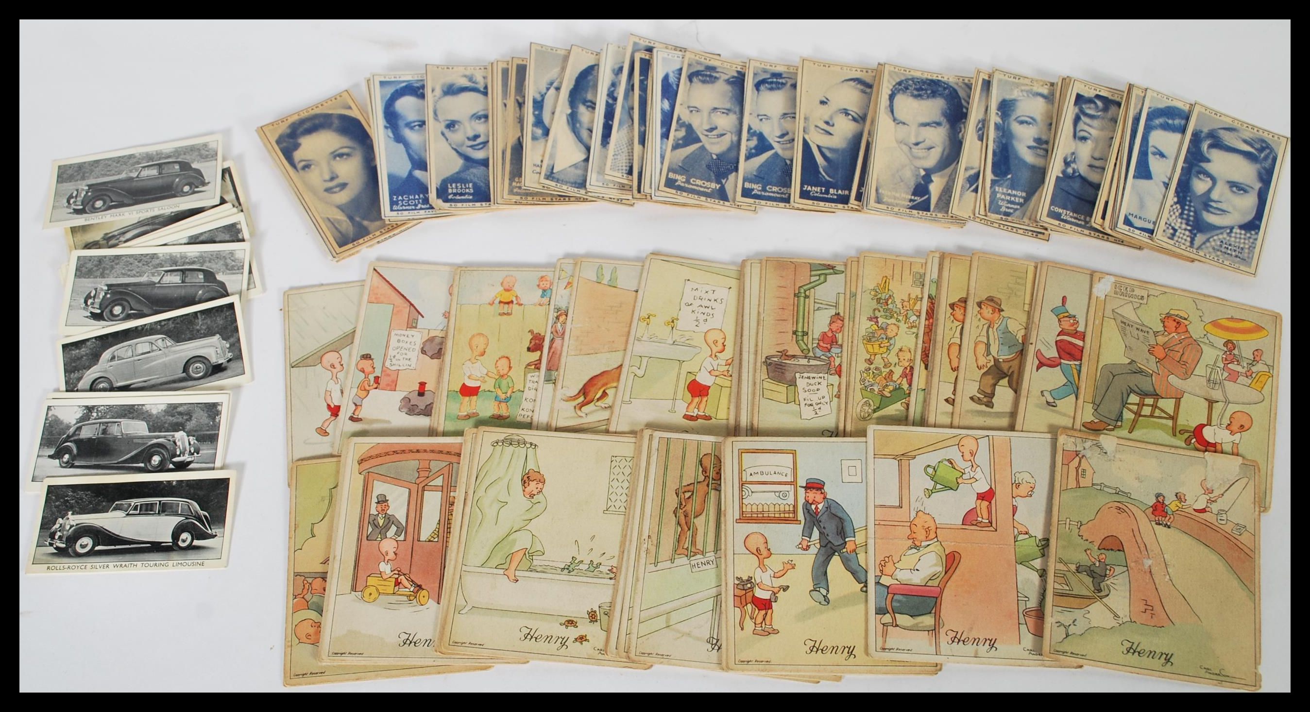 A collection of vintage cigarette cards to include a selection of J