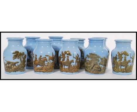 A group of nine 19th century Victorian prattware paste bottles having light blue ground with hunting scenes. Victorian date l