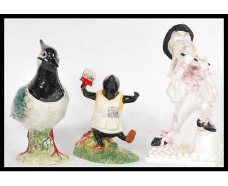 A group of ceramic figurines to include Beswick 2416 Lapwing bird figurine, Royal Doulton Wind in the Willows figurine WW1 Th