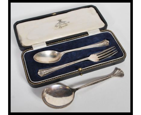 A&nbsp; silver hallmarked presentation fork and spoon with Sheffield hallmarks together with another silver hallmarked Roman 