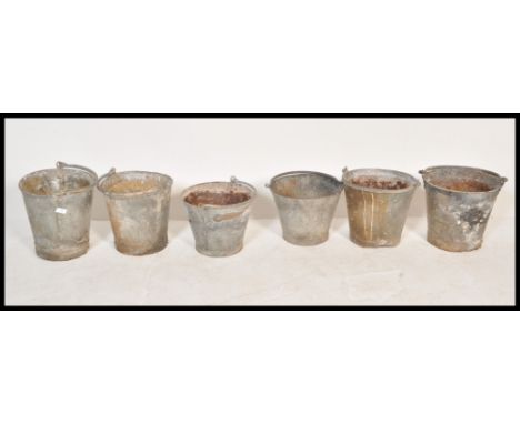 A collection of six vintage 20th Century galvanised metal / tin&nbsp; water buckets, each fitted with swing handles atop