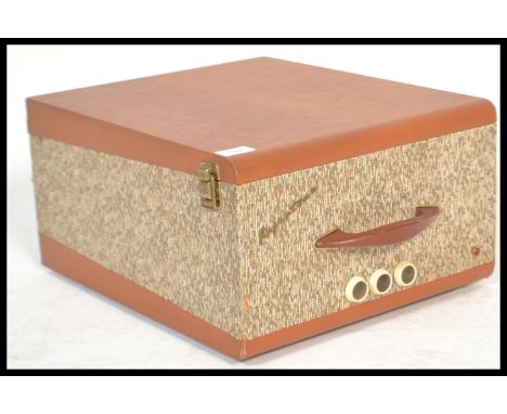 A vintage retro 20th Century Regintone vinyl record player turntable deck set in a two tone vinyl case with three cream bakel