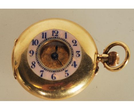 A ladies' 18ct. gold half hunter pocket watch, having white enamel Roman numeral dial, 32mm diameter case, the half hunter ca