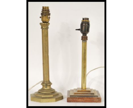 Two 20th Century brass stepped lamp bases, one being of octagonal form the other being square with a wooden base.&nbsp; Talle