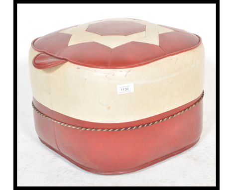 A retro mid century two tone vinyl panel stitched pouffe, having a geometric design to the top.&nbsp;Measures: 30cm high x 41