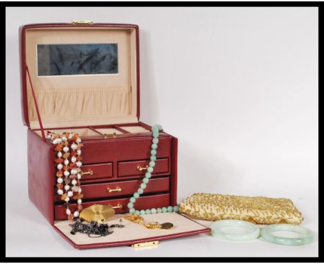 A group of vintage jewellery contained within jewellery box to include long strand baroque pearl necklaces, french jet jewell