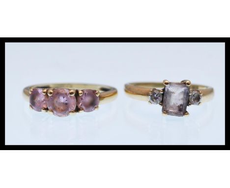 A hallmarked 9ct gold ring set with a square cut white stone with two white accent stones (hallmarked Sheffield, size P), a h