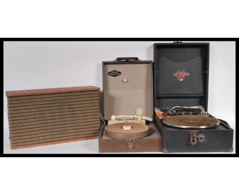 A vintage cased picnic table top gramophone record player along with another record player and a vintage speaker.