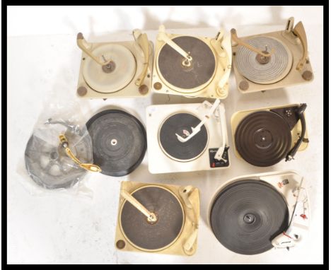 A collection of seven vintage 20th Century record player decks, to include several Garrard decks along with some BSR players.