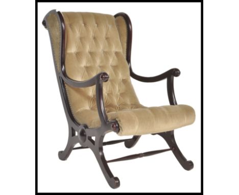 A Regency revival 20th Century chesterfield button back slipper chair, raised on an ebonised mahogany frame.&nbsp;Measures: 9