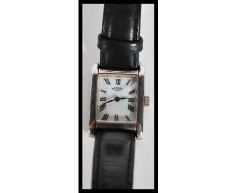 A vintage Rotary watch having a square face with a sterling silver case with mother of pearl face and roman numerals to the c