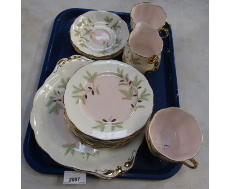 A Royal Albert porcelain part tea service decorated in the Braemar pattern, comprising five teacups, eight saucers, two sugar