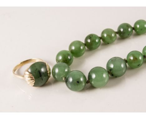 Graduated jadeite bead necklace, 7.5mm - 12mm, 60cm long, jade ring, oval cabochon cut stone in yellow metal mount, stamped 5