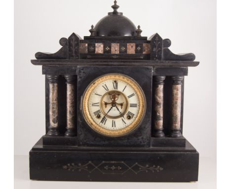 Black slate mantle clock, twin train movement with cream dial, Roman numerals with visible escape wheel, architectoral case w
