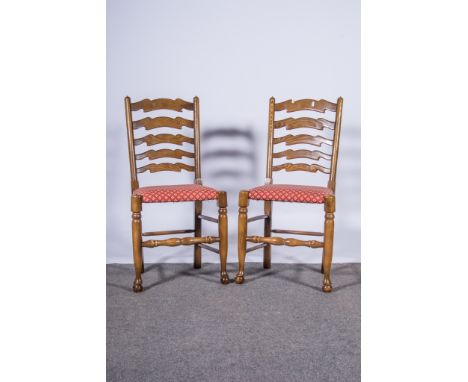 Matched set of six oak and ash wavy ladder-back dining chairs and an oak gateleg dining table, (7).